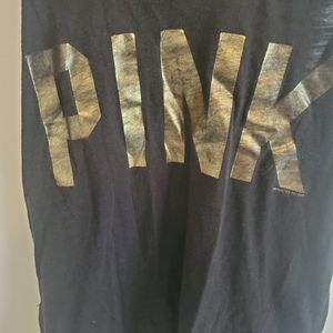 Black razorback tank. Loose fitting.